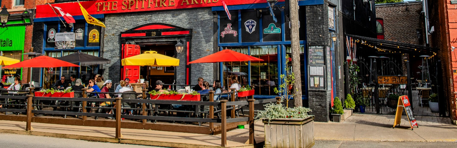 People eating on a patio outside a restaurant