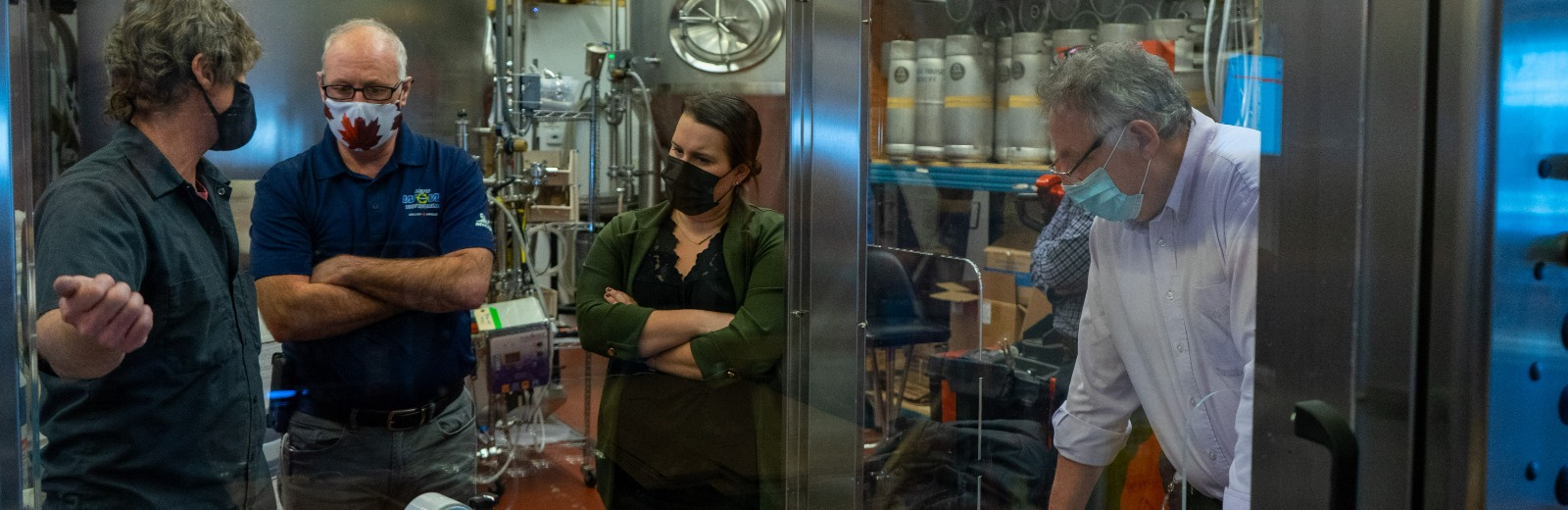 Staff working in a beverage manufacturing facility